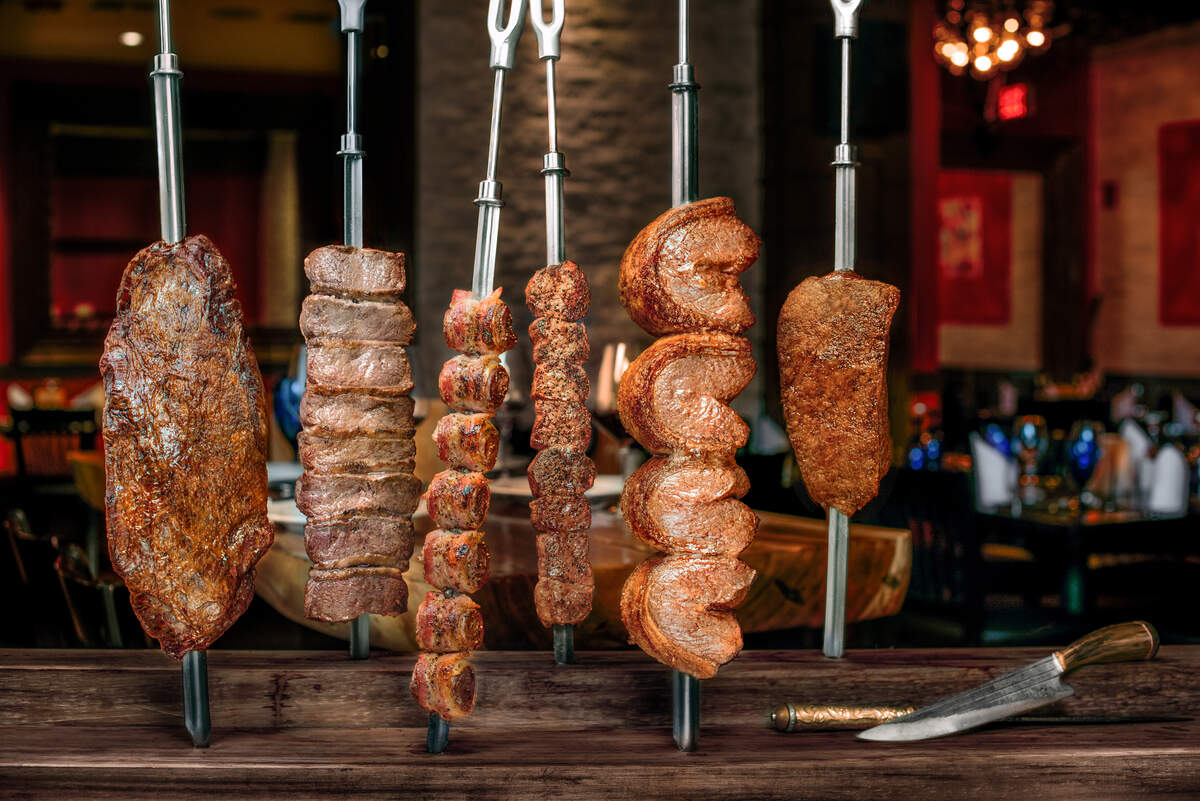 Texas de Brazil carries more than a dozen kinds of meat on skewers that are sliced at customers’ tables.
